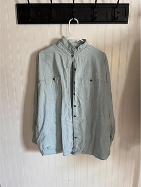Light Blue Vintage Button-Up Shirt with Subtle Pattern